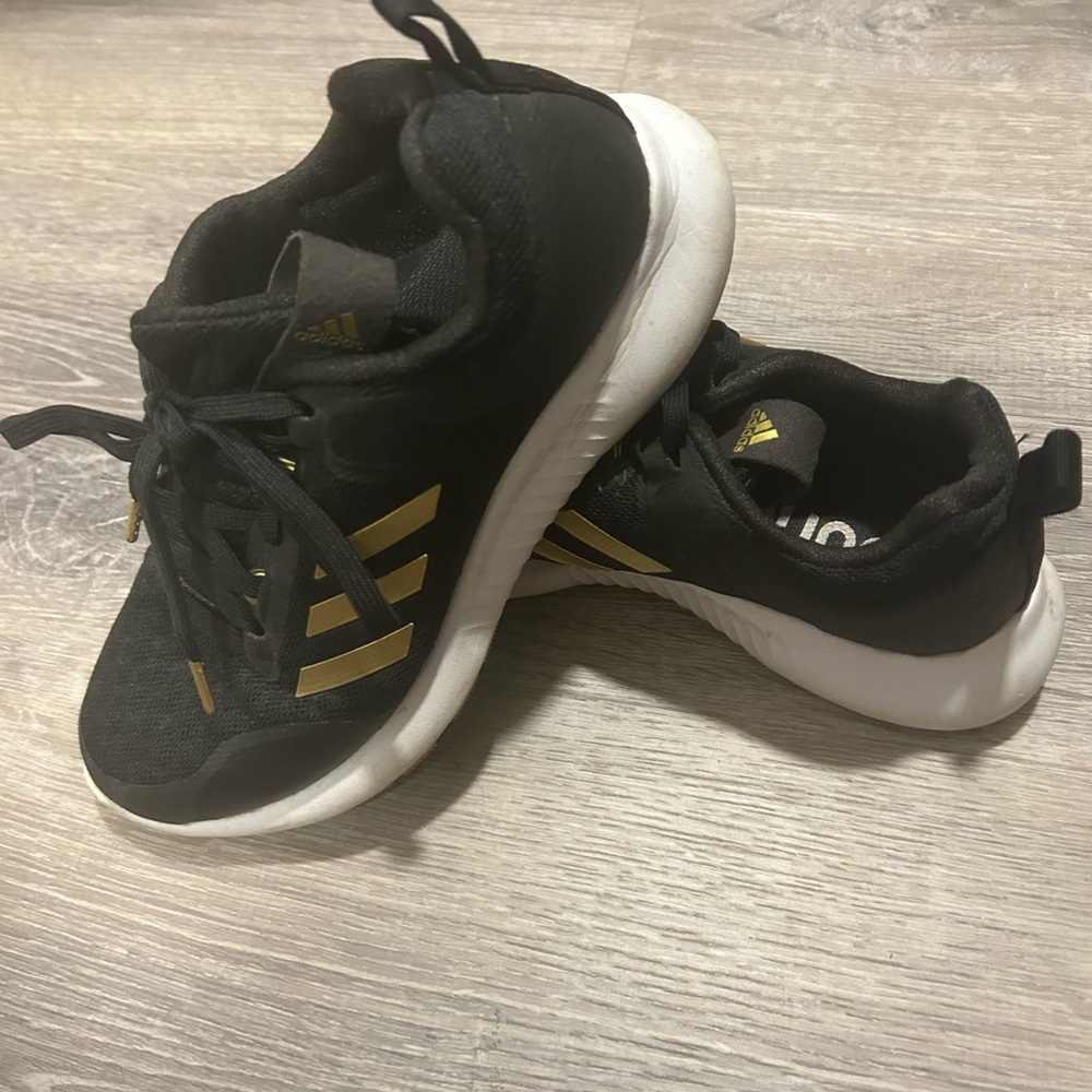 Adidas Black and Gold Sneakers